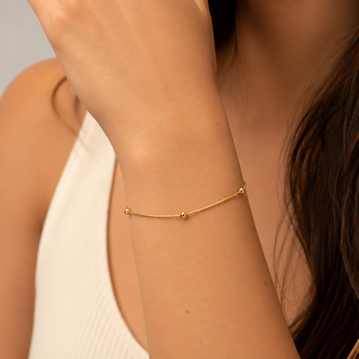 Pulseira Delicata Esferas Banhada a Ouro